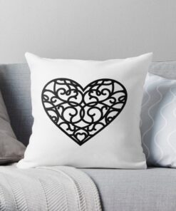 White throw pillow with heart design
