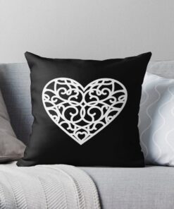Black throw pillow with heart designs